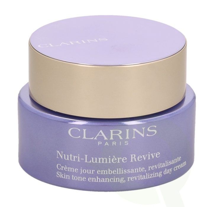 Clarins Nutri-Lumiere Revive Revitalizing Day Cream 50 ml All Skin Types i gruppen HELSE OG SKJØNNHET / Hudpleie / Ansikt / Ansiktskrem hos TP E-commerce Nordic AB (C48975)
