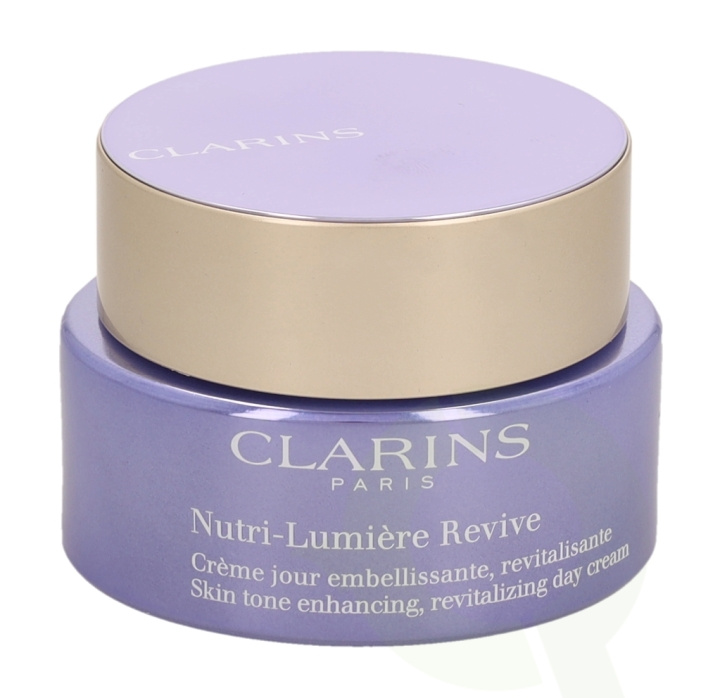 Clarins Nutri-Lumiere Revive Revitalizing Day Cream 50 ml All Skin Types i gruppen HELSE OG SKJØNNHET / Hudpleie / Ansikt / Dagkrem hos TP E-commerce Nordic AB (C48975)