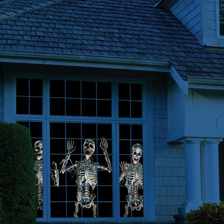 Vindusprojektor med jule- og halloweenmotiver